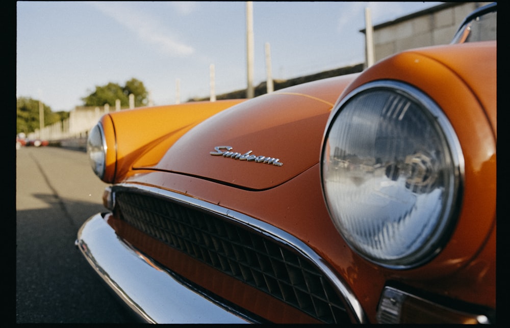 orange car with white and yellow light