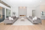 white couch and brown wooden table