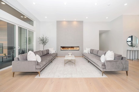 white couch and brown wooden table