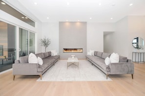 white couch and brown wooden table