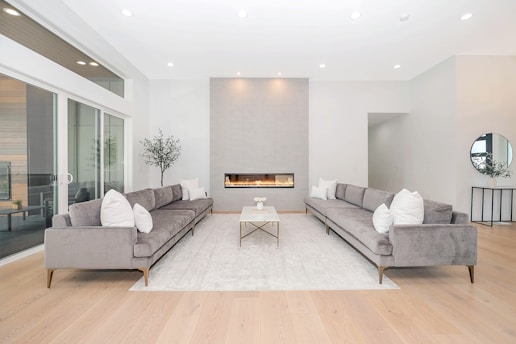 white couch and brown wooden table