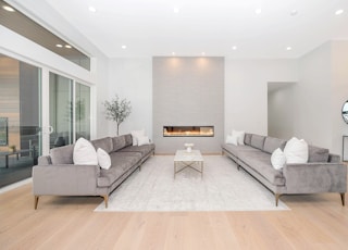 white couch and brown wooden table