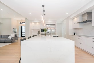 white wooden table with chairs