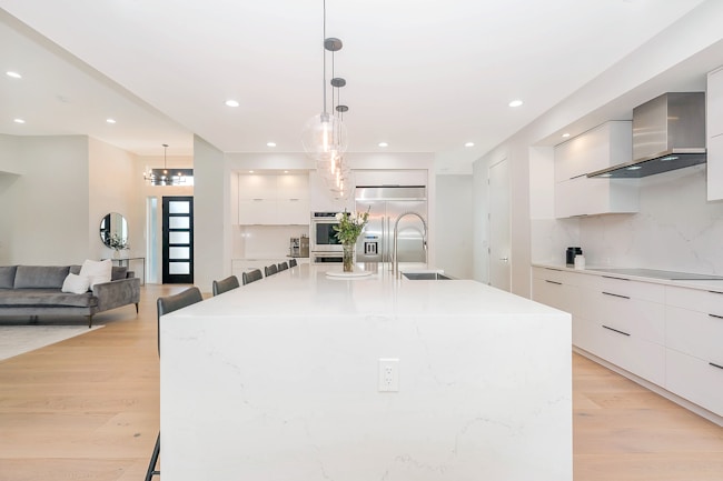 white wooden table with chairs