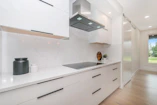 white and black wooden kitchen cabinet
