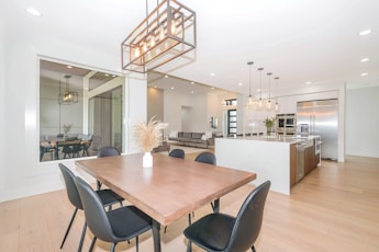 brown wooden table with chairs