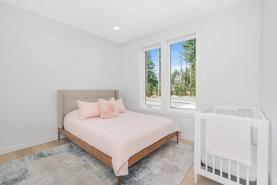 white bed with white bed linen