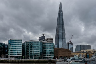 A city skyline featuring modern apartment buildings symbolizing property investment.