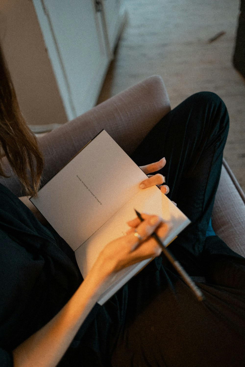 person holding white printer paper