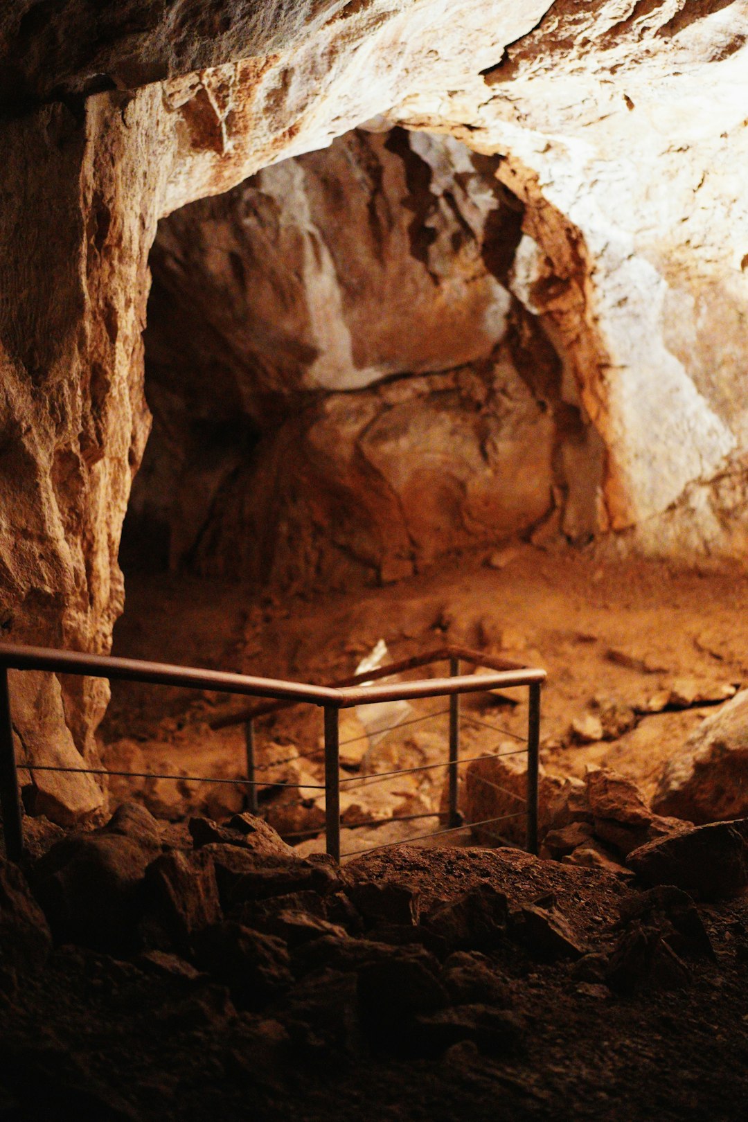 brown wooden staircase in cave