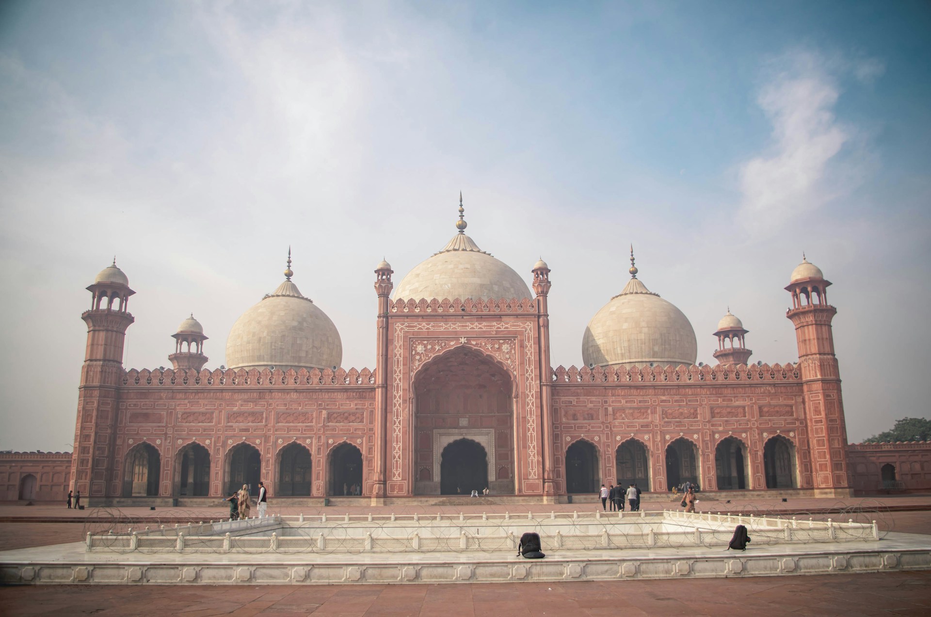 brown and white dome building under white sky during daytime