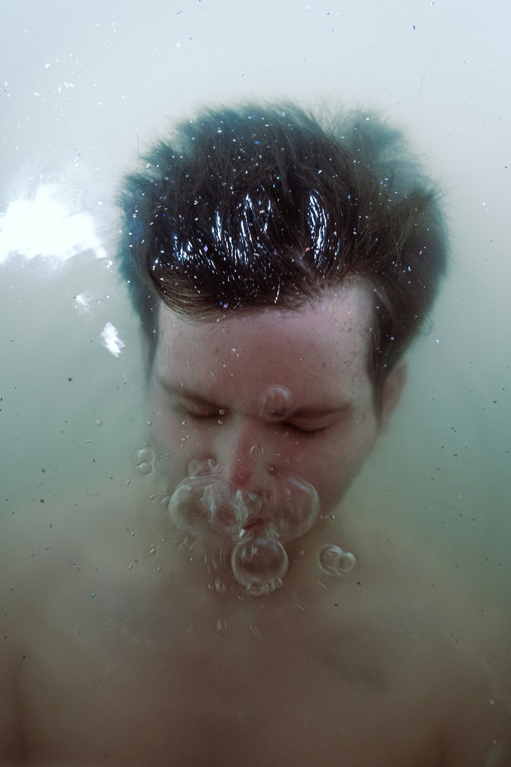 boy in water with bubbles