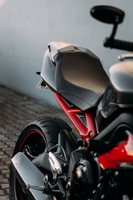white and red sports bike