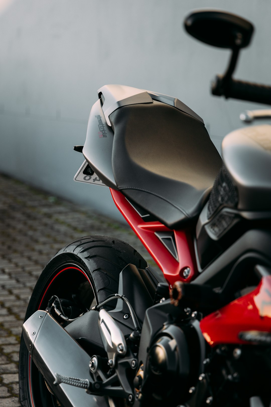 white and red sports bike