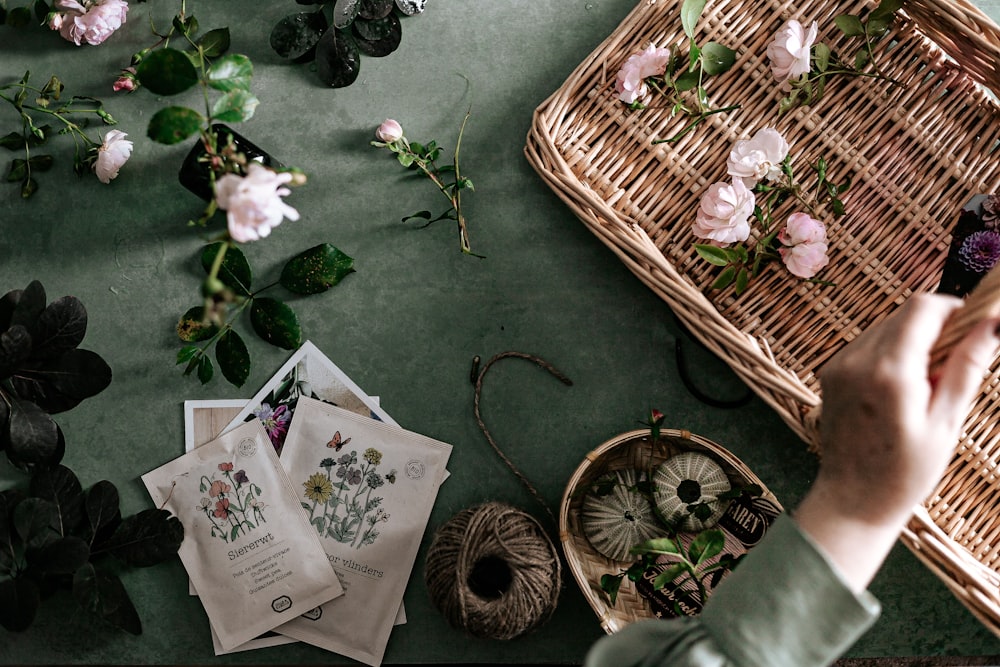 brown woven basket with white flowers