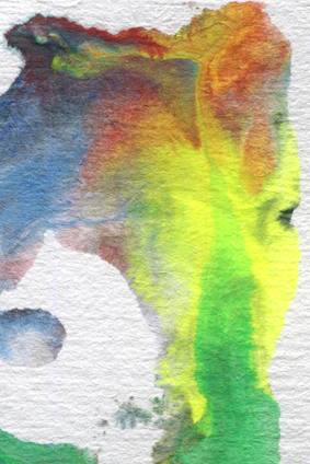 A vibrant abstract watercolor painting featuring fluid transitions between various colors. The image includes shades of blue, red, yellow, green, and hints of purple blending seamlessly together. The texture of the watercolor paper is visible, enhancing the tactile quality of the artwork.