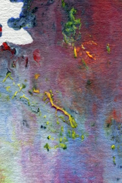 An abstract painting featuring a blend of bold colors including red, blue, purple, and green. The texture appears rough with many overlapping layers, creating a sense of depth. Bright yellow and green streaks add contrast, while the background shifts subtly from dark to light tones.