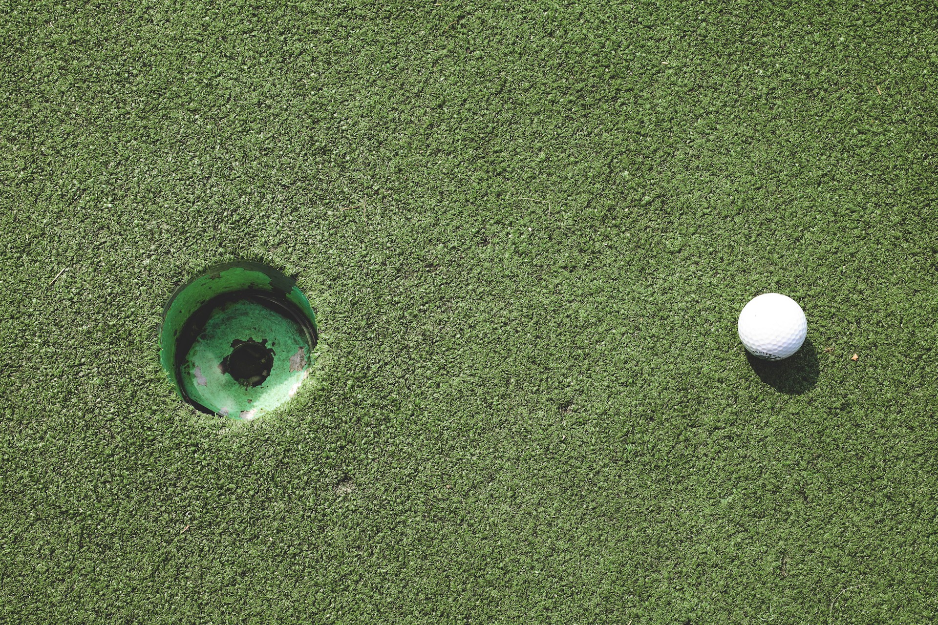 clear glass ball on green grass