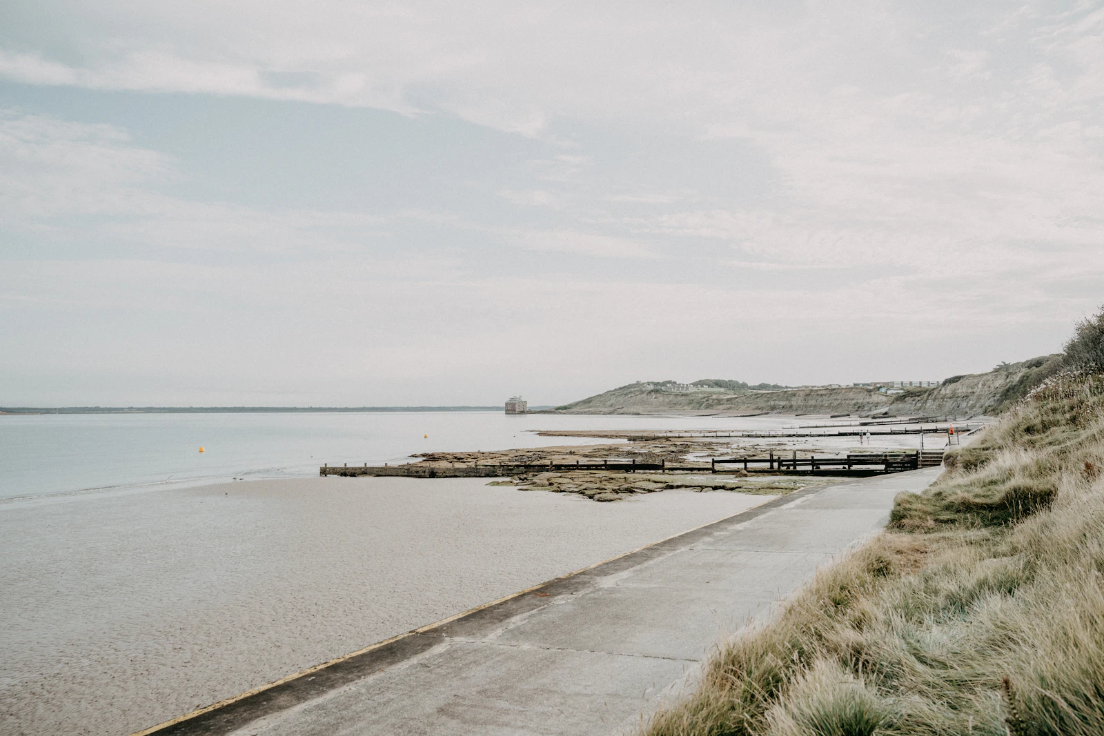 A quiet coast road running beside the sea