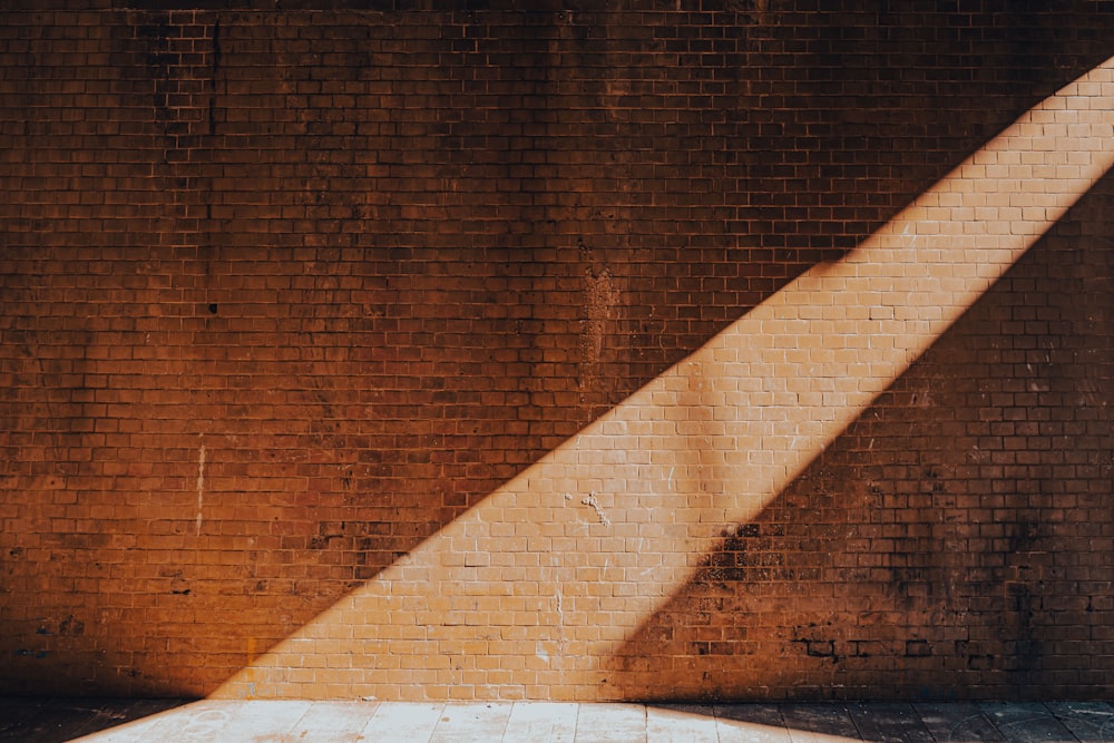 brown brick wall during daytime