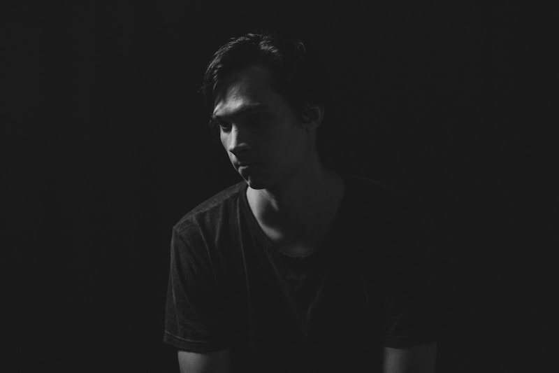 Man in black crew neck t-shirt