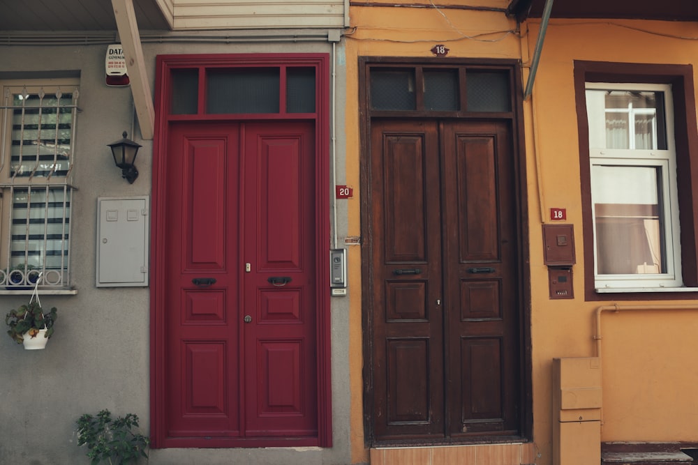 brown wooden door on white painted wall