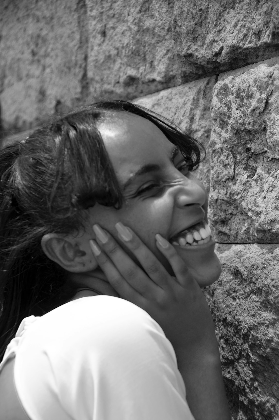 grayscale photo of woman in white shirt