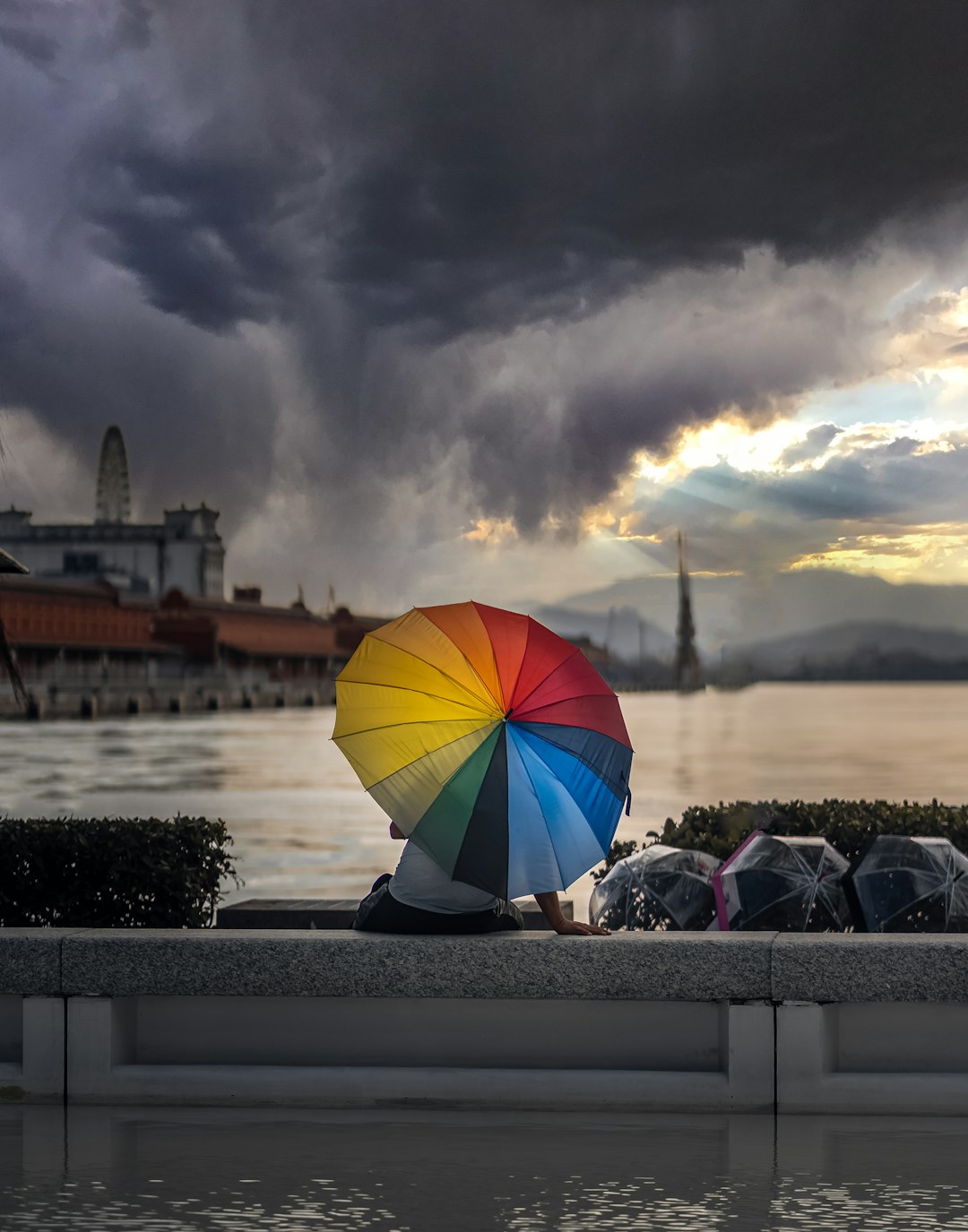 red umbrella on gray concrete floor