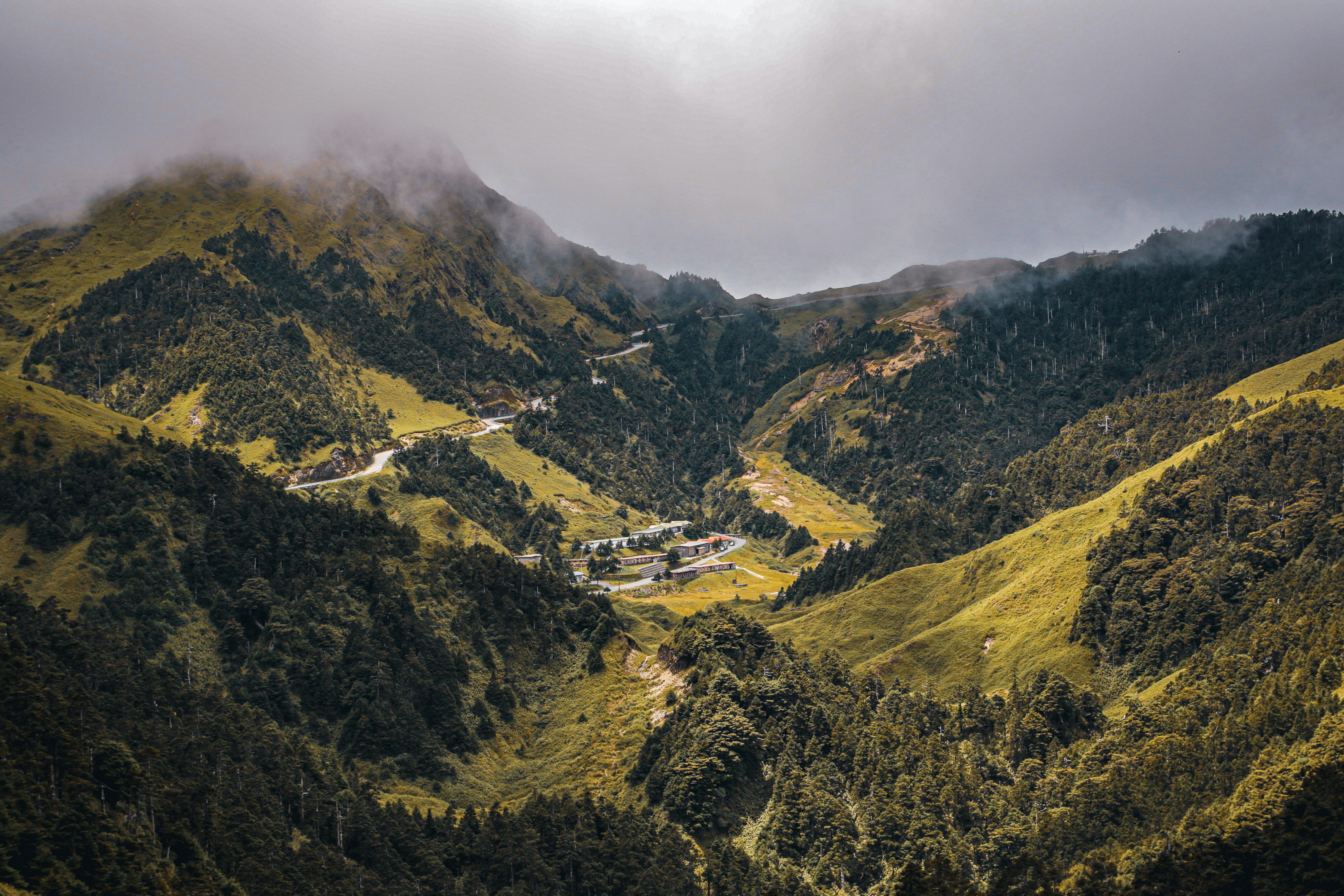 green mountains under white sky during daytime