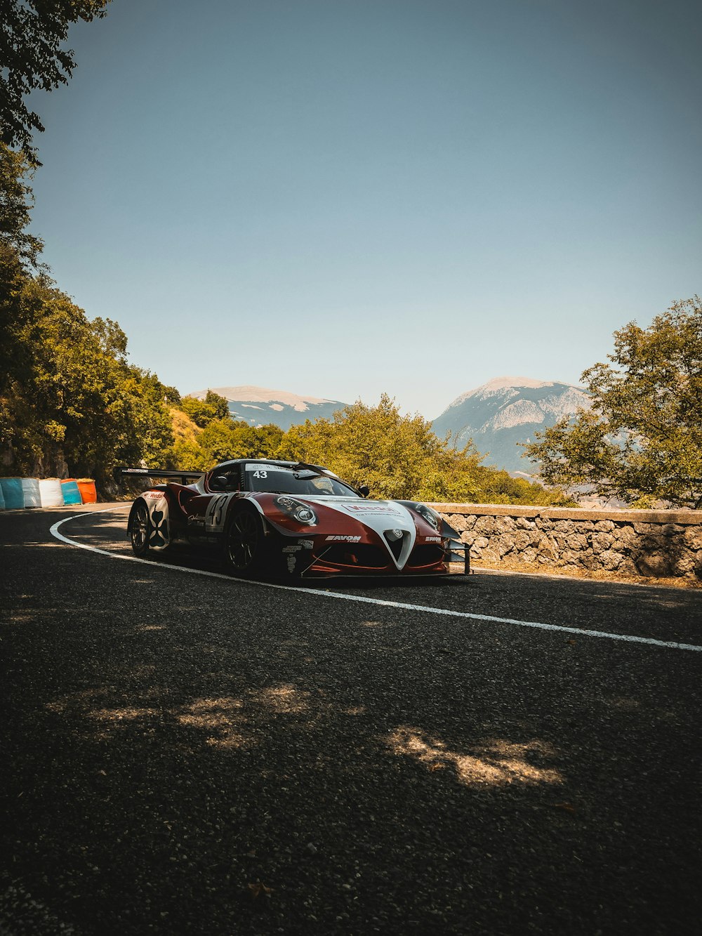 black and white sports car on road during daytime