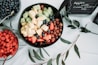 sliced fruits on black ceramic bowl