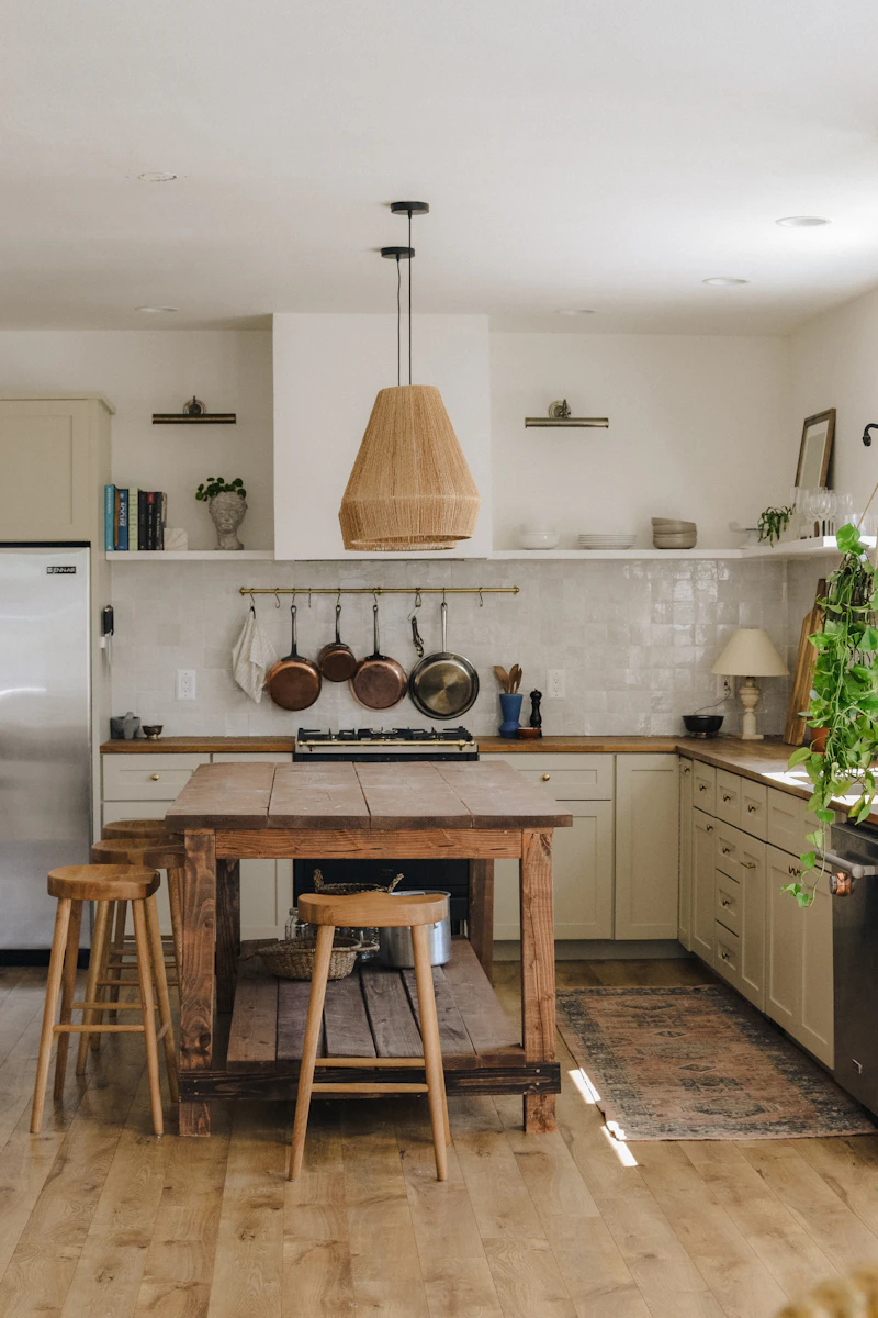 Warm kitchen with wooden dining table