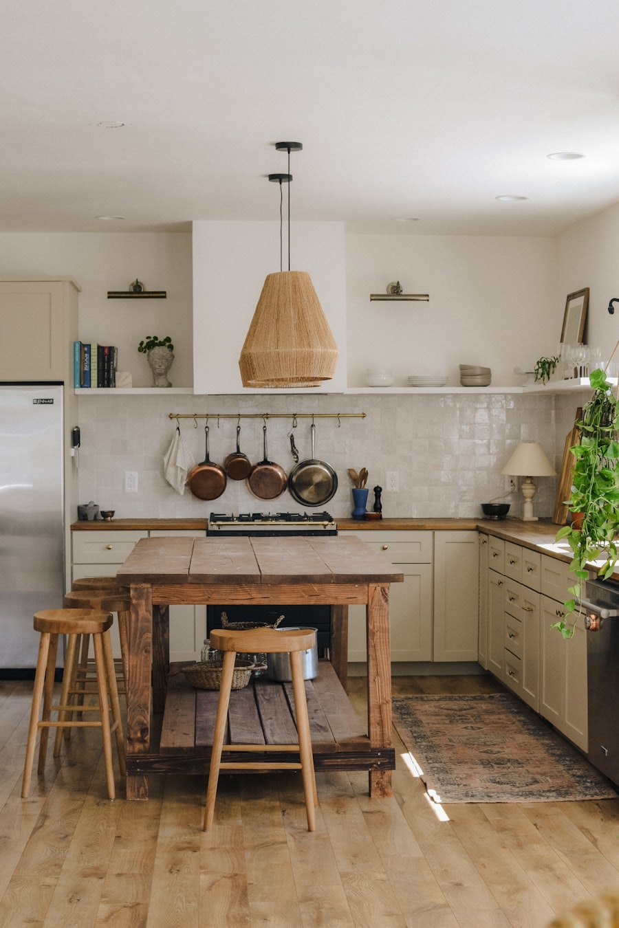 Clean, warm kitchen with a wooden island after a deep clean