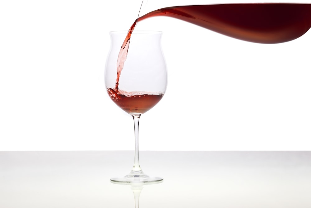 Red wine in clear wine glass photo – Free Wine Image on Unsplash
