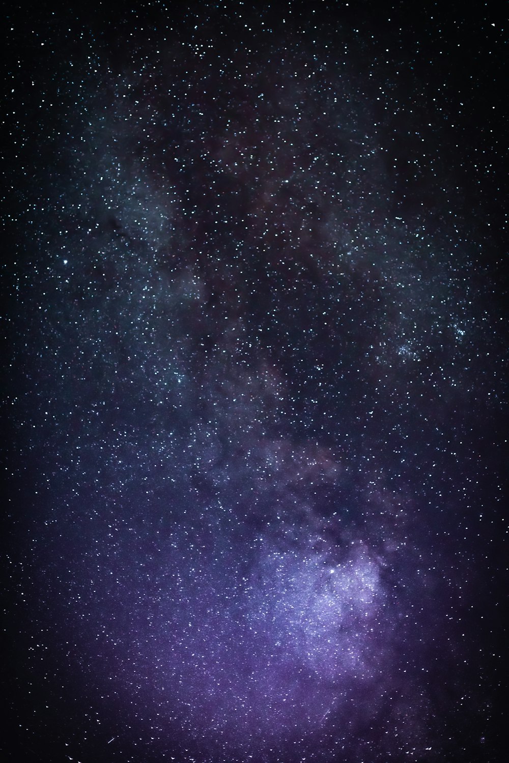 purple and blue sky with stars