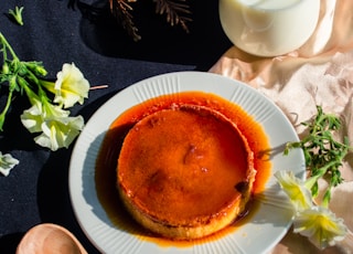 brown pie on white ceramic plate