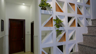Wooden partition walls adding warmth and privacy to an open office space.