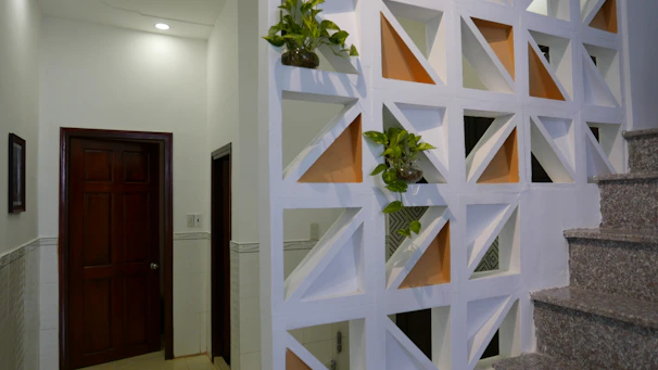 A stylish hanging wall divider in a modern living space.