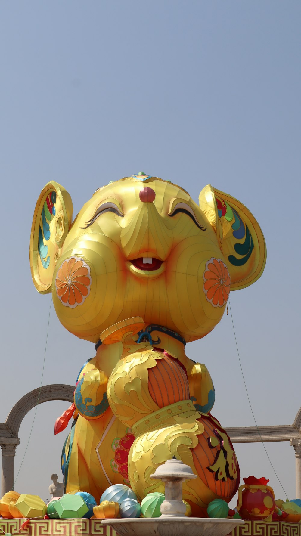 yellow and red dragon balloon