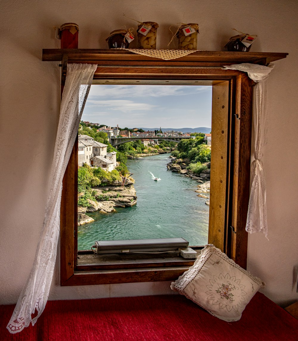 brown wooden framed glass window