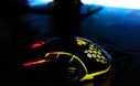 black and yellow gaming mouse