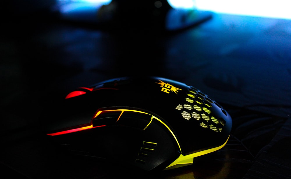black and yellow gaming mouse