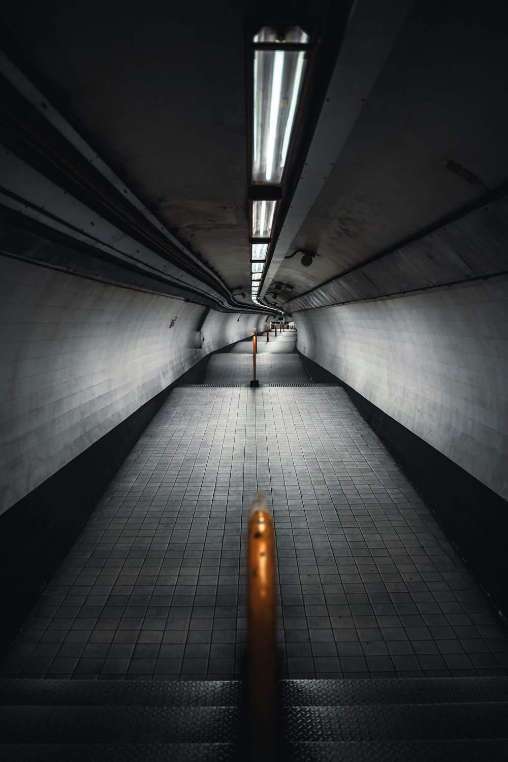 white and black tunnel with light