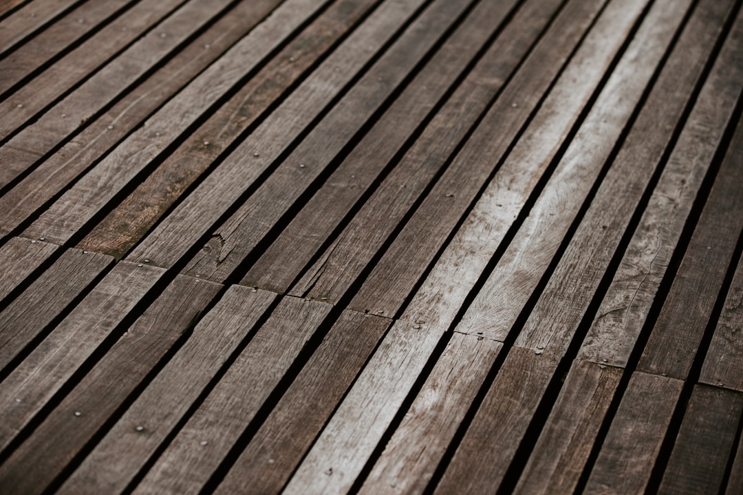 brown wooden plank in close up photography,