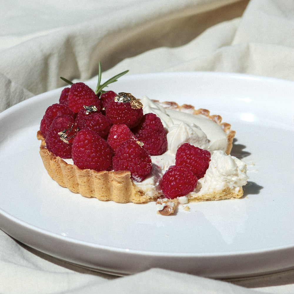 strawberry cake on white ceramic plate