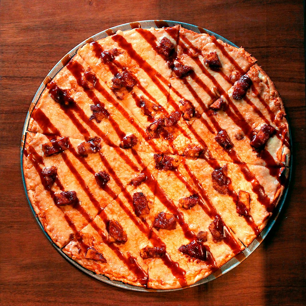 brown and white pie on brown wooden table