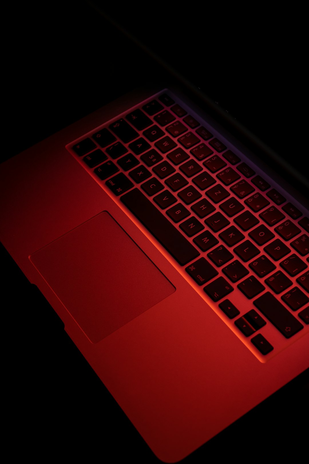 red and black laptop computer