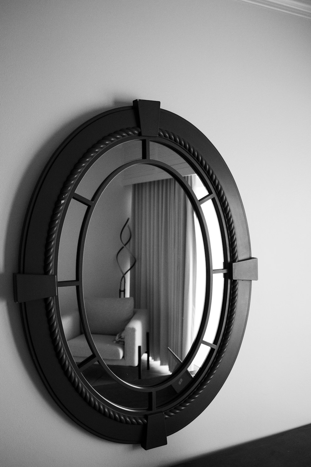 round mirror with black frame