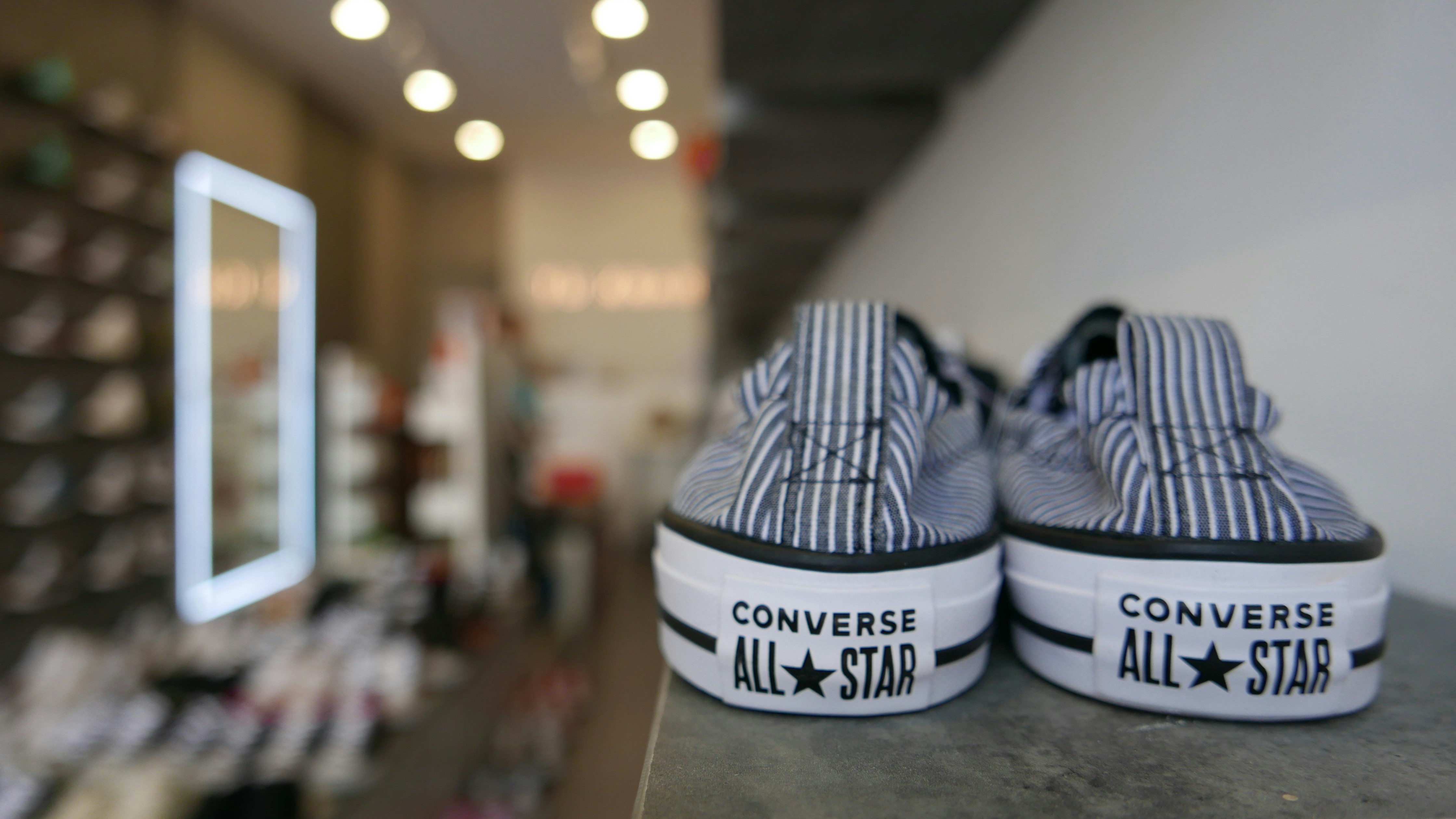 white and black adidas sneakers