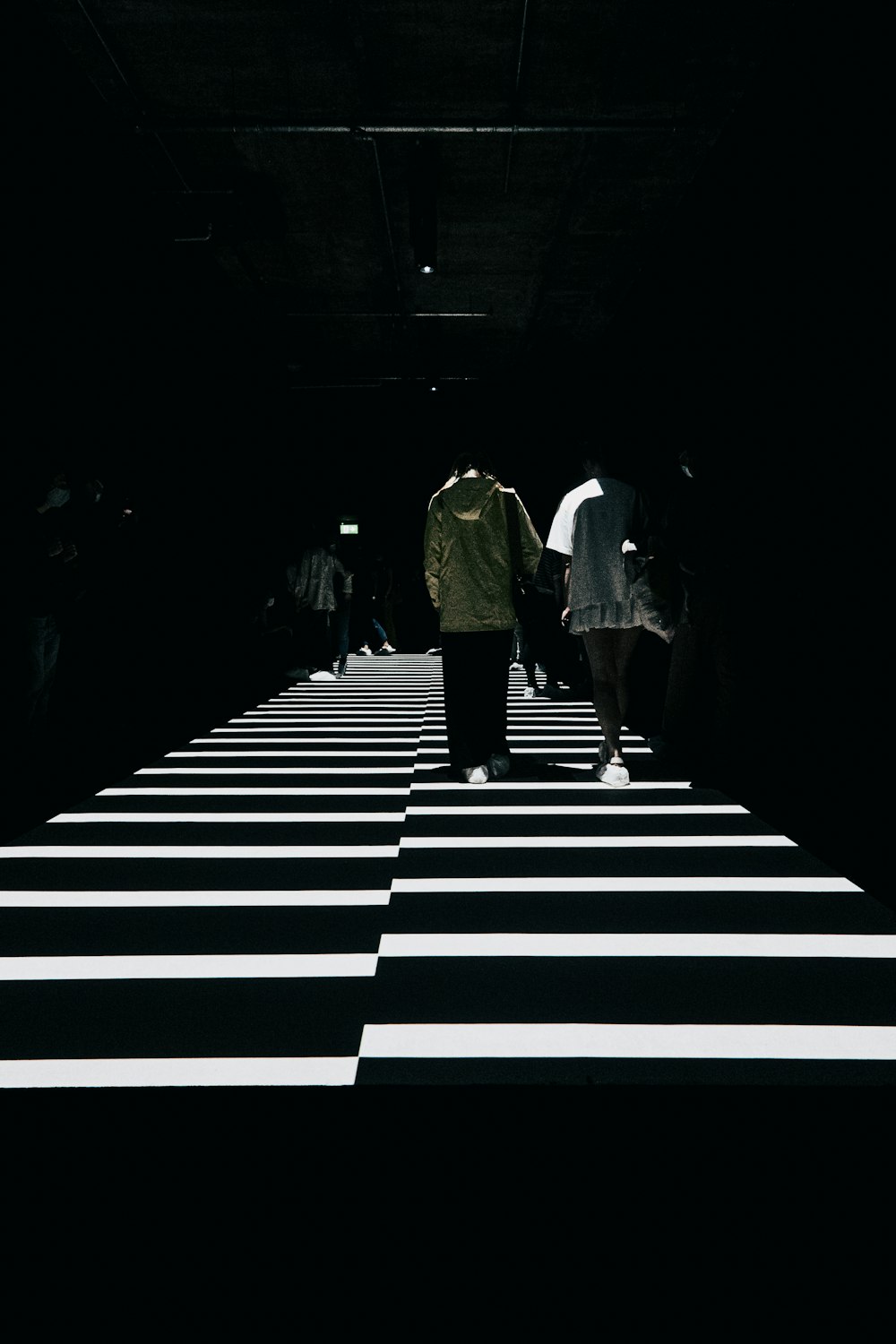 man and woman walking on the stairs